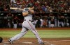 San Francisco Giants' Alex Dickerson follow through on a two-run double against the Arizona Diamondbacks during the third inning of a baseball game Saturday, June 22, 2019, in Phoenix. (AP Photo/Ross D. Franklin)