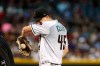 Arizona Diamondbacks starting pitcher Taylor Clarke pauses on the mound during the third inning of a baseball game against the San Francisco Giants, Friday, June 21, 2019, in Phoenix. (AP Photo/Ross D. Franklin)