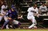 Arizona Diamondbacks' Jarrod Dyson, right, watches his walk-off, two-run home run next to Texas Rangers catcher Jeff Mathis during a baseball game Tuesday, April 9, 2019, in Phoenix. The Diamondbacks won 5-4. (AP Photo/Ross D. Franklin)