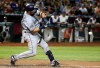 San Diego Padres' Austin Hedges swing on a three-run home run against the Arizona Diamondbacks during the sixth inning of a baseball game Thursday, April 11, 2019, in Phoenix. (AP Photo/Ross D. Franklin)