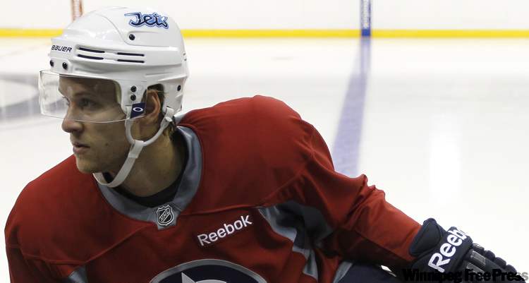 TREVOR HAGAN / WINNIPEG FREE PRESS Archives
Paul Postma, seen here during Winnipeg Jets practice at in September, has been recalled to the team from the St. John’s IceCaps.
