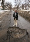 Melissa Tait / Winnipeg Free Press
Driving school owner Richard Mutungi says slowing down and driving over a pothole is the best course of action.