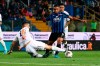Atalanta's Luis Muriel, right, and Fiorentina's Nikola Milenkovic challenge for the ball during the Italian Serie A soccer match between Atalanta and Fiorentina at the Tardini stadium in Parma, Italy, Sunday, Sept. 22, 2019. (Paolo Magni/ANSA via AP)