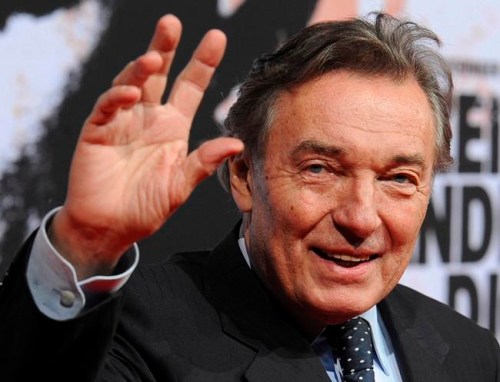 FILE - This Feb.3, 2010 file photo shows most popular Czech pop singer Karel Gott during a film premiere in Berlin, Germany. Gott died at 80 on Tuesday, October 1, before midnight at home in his family circle, his spokeswoman Aneta Stolzova said Wednesday, Oct. 2, 2019. (Jens Kalaene/dpa via AP)
