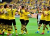 File---Picture taken Aug.17, 2019 shows Dortmund's Paco Alcacer holding the ball as he celebrates after scoring his side's first goal during the German Bundesliga soccer match between Borussia Dortmund and FC Augsburg at the Signal Iduna Park stadium in Dortmund, Germany. (AP Photo/Martin Meissner)