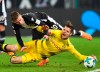 FILE--- Picture taken on Sunday, Feb. 18, 2018 Dortmund's Julian Weigl, right, and Moenchengladbach's Thorgan Hazard challenge for the ball during the German Bundesliga soccer match between Borussia Moenchengladbach and Borussia Dortmund in Moenchengladbach, Germany, (AP Photo/Martin Meissner)