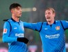File--- Picture taken Jan.26, 2019, shows Leverkusen's Kai Havertz with Julian Brandt in Wolfsburg, Germany. (Peter Steffen/dpa via AP)