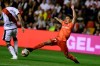 Reasl Madrid's Brahim, right, stretches for the ball by Rayo Vallecano's Oscar Guido Trejo during a Spanish La Liga soccer match between Rayo Vallecano and Real Madrid at the Vallecas stadium in Madrid, Spain, Sunday, April 28, 2019. (AP Photo/Paul White)