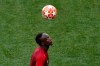Liverpool forward Mohamed Salah heads a ball during a training session at the Wanda Metropolitano stadium in Madrid, Friday May 31, 2019. English Premier League teams Liverpool and Tottenham Hotspur are preparing for the Champions League final which takes place in Madrid on Saturday night. (AP Photo/Armando Franca)