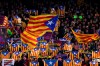 FILE - In this Feb. 6, 2019 file photo, Barcelona supporters wave Estelada or pro-independence flags during the Copa del Rey semifinal first leg soccer match between FC Barcelona and Real Madrid at the Camp Nou stadium in Barcelona, Spain. Next week's 