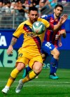 Barcelona's Lionel Messi controls the ball during a Spanish La Liga soccer match between Eibar and FC Barcelona at the Ipurua stadium in Eibar, Spain, Saturday Oct. 19, 2019. (AP Photo/Alvaro Barrientos)