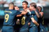 Real Madrid's Toni Kroos, centre front, celebrates with team mates after scoring his side's second goal during La Liga soccer match between Celta and Real Madrid at the BalaÃ­dos Stadium in Vigo, Spain, Saturday, Aug. 17, 2019. (AP Photo/Luis Vieira)