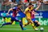 Barcelona's Lionel Messi, centre, tries to get between Eibar's Anaitz Arbilla and Sergio Alvarez during a Spanish La Liga soccer match between Eibar and FC Barcelona at the Ipurua stadium in Eibar, Spain, Saturday Oct. 19, 2019. (AP Photo/Alvaro Barrientos)