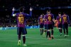 Barcelona's Lionel Messi, left, celebrates after scoring his side's third goal during the Champions League round of 16, 2nd leg, soccer match between FC Barcelona and Olympique Lyon at the Camp Nou stadium in Barcelona, Spain, Wednesday, March 13, 2019. (AP Photo/Emilio Morenatti)