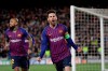 Barcelona's Lionel Messi, right, celebrates after scoring his side's third goal during the Champions League round of 16, 2nd leg, soccer match between FC Barcelona and Olympique Lyon at the Camp Nou stadium in Barcelona, Spain, Wednesday, March 13, 2019. (AP Photo/Emilio Morenatti)