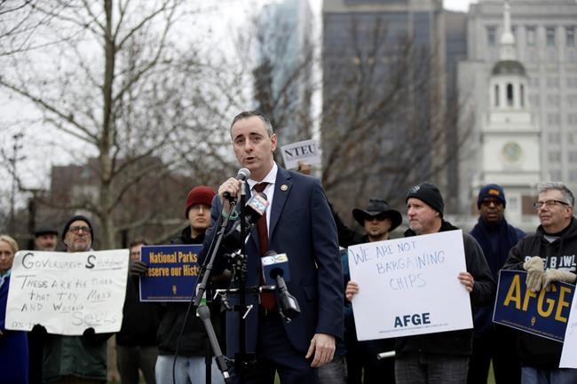 Rep. Brian Fitzpatrick, R-Pa., speaks during a demonstration against the partial government shutdown in view of Independence Hall in Philadelphia, Tuesday, Jan. 8, 2019. (AP Photo/Matt Rourke)