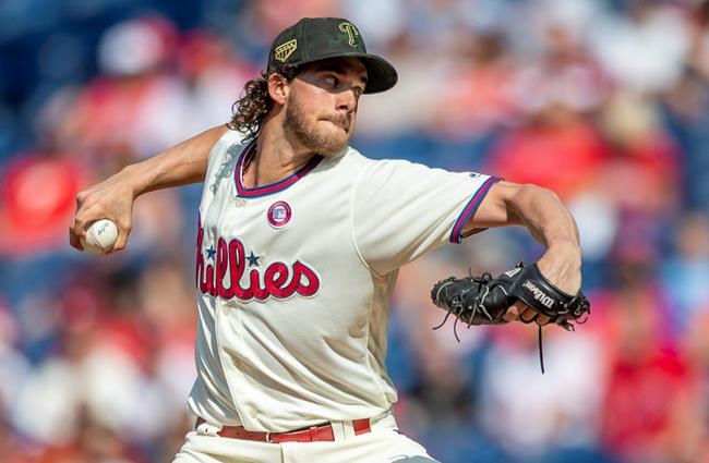 Philadelphia Phillies starting pitcher Aaron Nola throws during the first inning of a baseball game against the Colorado Rockies, Saturday, May 18, 2019, in Philadelphia. (AP Photo/Laurence Kesterson)