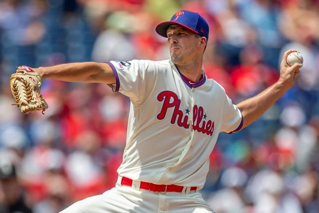 Philadelphia Phillies starting pitcher Drew Smyly (18) throws during the first inning of a baseball game against the Chicago White Sox, Sunday, Aug. 4, 2019, in Philadelphia. (AP Photo/Laurence Kesterson)
