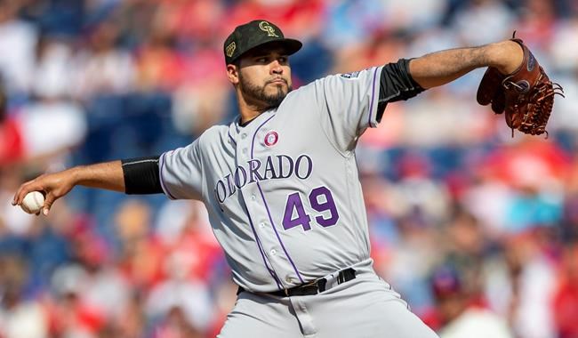 Colorado Rockies starting pitcher Antonio Senzatela throws during the first inning of a baseball game against the Philadelphia Phillies, Saturday, May 18, 2019, in Philadelphia. (AP Photo/Laurence Kesterson)