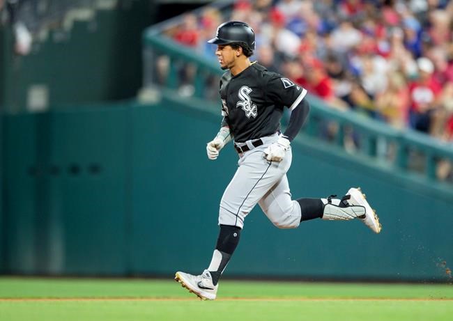 Chicago White Sox's Jon Jay (45) runs to second base on an RBI-double in the fourth inning of a baseball game against the Philadelphia Phillies, Saturday, Aug. 3, 2019, in Philadelphia. Leury Garcia scored. (AP Photo/Laurence Kesterson)