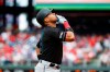 Miami Marlins' Starlin Castro reacts after hitting a home run off Philadelphia Phillies relief pitcher Blake Parker during the second inning of a baseball game, Sunday, Sept. 29, 2019, in Philadelphia. (AP Photo/Matt Slocum)