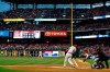 Philadelphia Phillies' J.T. Realmuto hits a two-run double off New York Mets starting pitcher Steven Matz during the first inning of a baseball game, Tuesday, April 16, 2019, in Philadelphia. (AP Photo/Matt Slocum)