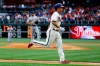 Philadelphia Phillies' Scott Kingery, right, rounds the bases past New York Mets starting pitcher Zack Wheeler after hitting a home run during the fifth inning of a baseball game, Wednesday, April 17, 2019, in Philadelphia. Philadelphia won 3-2. (AP Photo/Matt Rourke)