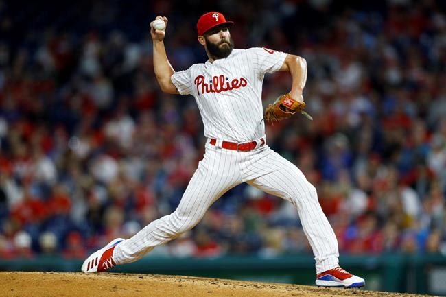 Philadelphia Phillies' Jake Arrieta pitches during the fourth inning of a baseball game against the Milwaukee Brewers, Wednesday, May 15, 2019, in Philadelphia. (AP Photo/Matt Slocum)