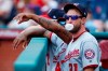 Washington Nationals' Max Scherzer blows a bubble in the dugout during a baseball game against the Philadelphia Phillies, Sunday, July 14, 2019, in Philadelphia. (AP Photo/Matt Slocum)