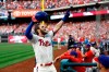 Philadelphia Phillies' Bryce Harper celebrates after hitting a home run off Atlanta Braves relief pitcher Jesse Biddle during the seventh inning of a baseball game, Saturday, March 30, 2019, in Philadelphia. (AP Photo/Matt Slocum)