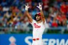 Philadelphia Phillies' Sean Rodriguez gestures after hitting a double off Pittsburgh Pirates pitcher Steven Brault during the fourth inning of a baseball game, Tuesday, Aug. 27, 2019, in Philadelphia. (AP Photo/Matt Slocum)