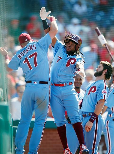 Philadelphia Phillies' Maikel Franco (7) and Rhys Hoskins (17) celebrate after Franco hit a two-run home run off New York Mets relief pitcher Edwin Diaz during the ninth inning of a baseball game, Thursday, June 27, 2019, in Philadelphia. Philadelphia won 6-3. (AP Photo/Matt Slocum)