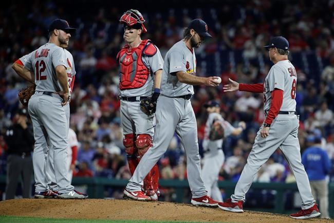 St. Louis Cardinals manager Mike Shildt, right, takes the ball from pitcher Michael Wacha during the fifth inning of a baseball game, Wednesday, May 29, 2019, in Philadelphia. (AP Photo/Matt Rourke)