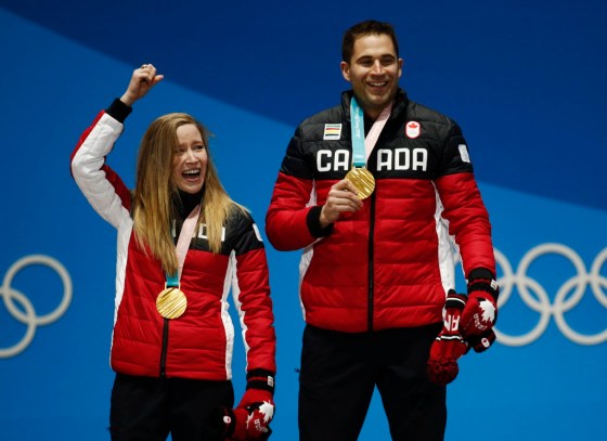 Curling mixed doubles gold medalists Kaitlyn Lawes, left, and John Morris. (Patrick Semansky / The Associated Press)