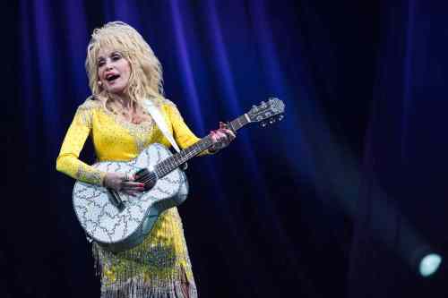 Christopher Dolan / The Citizens Voice via AP
Country music legend Dolly Parton performs at Mohegan Sun Arena in Wilkes-Barre Twp., Pa. during her Pure and Simple Tour on Wednesday, June 22, 2016.