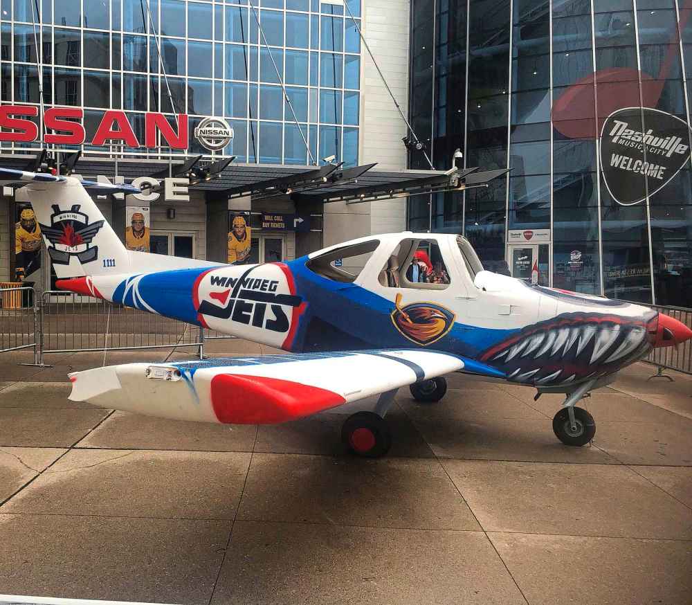 Mike McIntyre / Winnipeg Free Press
As a way to engage their fanbase at home games, the Predators paint up vehicles in the opposing team's colours and allow fans to smash them with a hammer before their games. Here, a plane is painted with the Jets' colours and logo and awaits demolition.