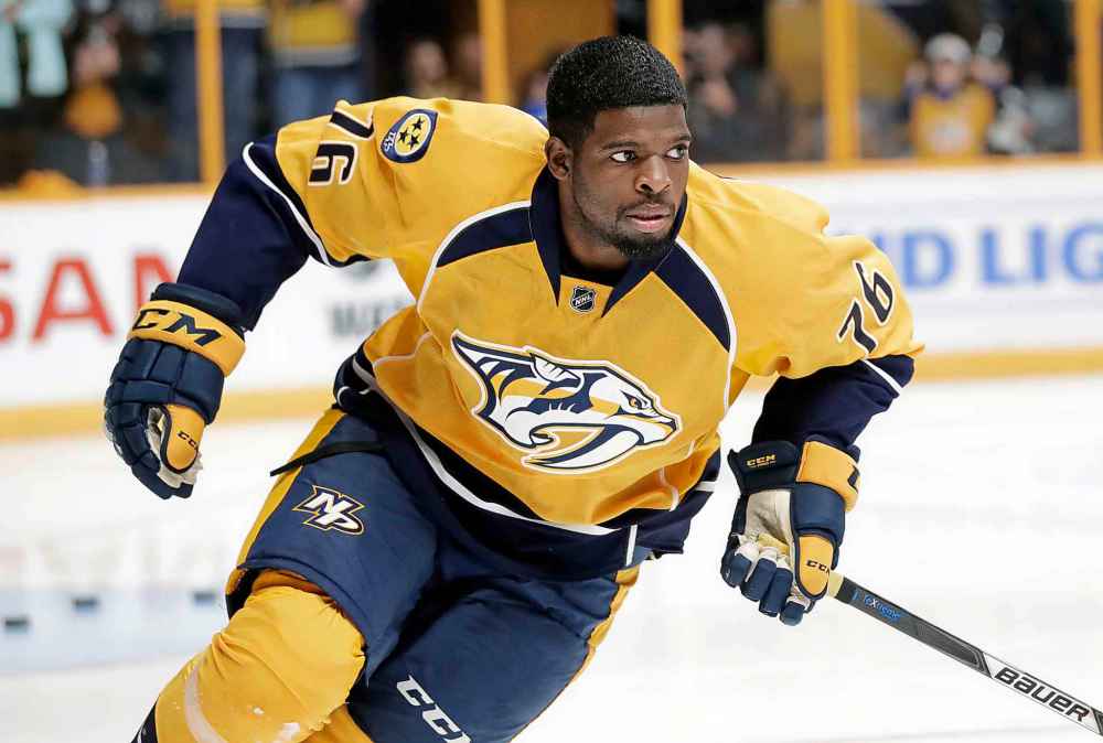 Ice Hockey player P.K. Subban on the grid with his partner Lyndsey