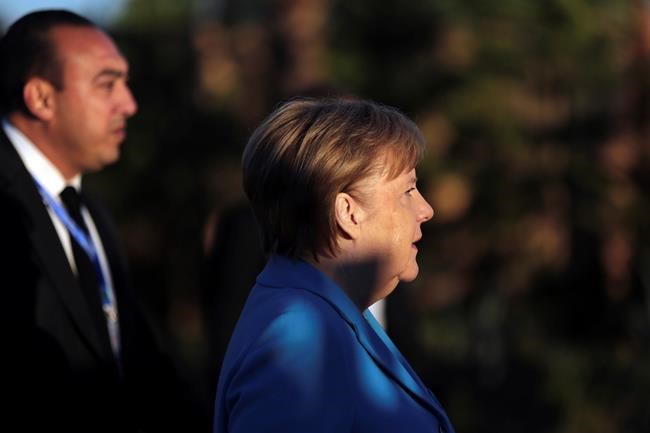 German Chancellor Angela Merkel arrives to attend a UN Migration Conference in Marrakech, Morocco, Monday, Dec.10, 2018. Top U.N. officials and government leaders from about 150 countries are uniting around an agreement on migration, while finding themselves on the defensive about the non-binding deal amid criticism and a walkout from the United States and some other countries. (AP Photo/Mosa'ab Elshamy)