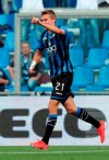 Atalanta's Timothy Castagne celebrates after scoring his side's second goal during a Serie A soccer between Atalanta and Genoa at the Mapei Stadium in Reggio Emilia, Italy, Saturday, May 11, 2019. (Paolo Magni/ANSA via AP)