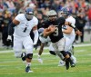Hans Pennink / The Associated Press 
Rice defensive lineman Christian Covington (left) is skipping his senior season in college to make himself eligible for the CFL and NFL drafts. Covington is ranked No. 1 by the CFL Scouting Bureau.