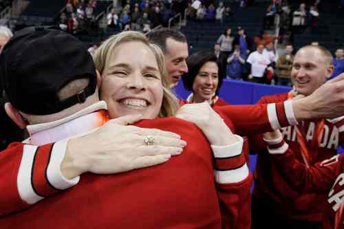 JOHN WOODS / THE CANADIAN PRESS
Women's champions Jennifer Jones (left) and Jill Officer congratulate (from left) Ryan Harnden, E.J. Harnden and Brad Jacobs after they won the men's final Sunday at the 2013 Roar of the Rings.