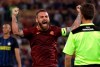 FILE - In this Oct. 2, 2016 file photo, Roma's Daniele De Rossi celebrates after his teammate Kostas Manolas scored during a Serie A soccer match between Roma and Inter Milan, at Rome's Olympic Stadium. Roma captain Daniele De Rossi surprisingly announced on Tuesday, May 14, 2019 he is leaving his hometown club after 18 years. (AP Photo/Andrew Medichini, file)