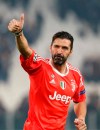 FILE - In this Nov. 22, 2017 file photo, Juventus goalkeeper Gianluigi Buffon gives the v-sign to fans at the end of the Champions League group D soccer match between Juventus and Barcelona, at the Allianz Stadium in Turin, Italy. The longtime Bianconeri goalkeeper was undergoing medical tests with Juventus on Thursday, July 4, 2019, after which he was expected to sign a one-year contract with the club after being away at Paris Saint-Germain for one season. (AP Photo/Antonio Calanni, file)