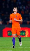 FILE - In this Friday, March 23, 2018 file photo, Matthijs de Ligt of the Netherlands runs back up the pitch during the international friendly soccer match between the Netherlands and England in Amsterdam, Netherlands. Defender Matthijs de Ligt is undergoing medical exams with Juventus ahead of an expected 70 million euros ($80 million) transfer from Ajax. Juventus shared photos and videos on social media of De Ligt's arrival in Turin late Tuesday then fans awaiting him outside the club's training facility when he showed up early Wednesday, July 17, 2019.(AP Photo/Peter Dejong, File)