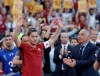 FILE - In this Sunday, May 28, 2017 file photo, Roma President James Pallotta, right, applauds as Francesco Totti waves to his fans after an Italian Serie A soccer match between Roma and Genoa at the Olympic stadium in Rome. Former Roma captain Francesco Totti has announced, Monday, June 17, 2019, that he is leaving his position within Roma’s management because his views were not taken into consideration. Totti says that he “never had the chance to express myself” in decisions over the hiring and firing of coaches and moves in the player transfer market. Speaking at an extraordinary news conference at the Italian Olympic Committee, Totti says “it’s a day that I hoped never would have come.” (AP Photo/Alessandra Tarantino, File)