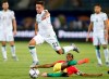 FILE - In this July 7, 2019 file photo Algeria's Ismael Bennacer, top center, and Guinea's Ibrahim Traore fight for the ball during the African Cup of Nations round of 16 soccer match between Guinea and Algeria in 30 June stadium in Cairo, Egypt. AC Milan Serie A club announced Sunday, Aug. 4, 2019, it has signed the Algerian midfielder Bennacer from Empoli with a five-year contract. (AP Photo/Ariel Schalit)