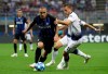 FILE - In this Tuesday, Sept. 18, 2018 file photo, Tottenham defender Eric Dier, right, vies for the ball with Inter midfielder Radja Nainggolan during the Champions League, group B soccer match between Inter Milan and Tottenham Hotspur, at the Milan San Siro Stadium, Italy. Inter Milan midfielder Radja Nainggolan has officially returned to Cagliari on loan, following a disappointing season with the Nerazzurri. Cagliari announced the season-long loan deal on Monday, Aug. 5, 2019. (AP Photo/Luca Bruno, File)