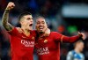 Roma's Gianluca Mancini, left, celebrates with his teammate Chris Smalling after scoring his side's second goal, during the Serie A soccer match between Roma and Bresciaat the Olympic stadium stadium in Rome, Sunday, Nov. 24, 2019. (Riccardo Antimiani/ANSA via AP)
