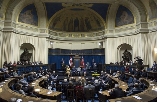 Paul Chiasson / THE CANADIAN PRESS
Prince Charles and his wife Camilla sit with Man. Lt. Governor Philip Lee at the Manitoba Legislature for the Order of Manitoba ceremony Wednesday, May 21, 2014 in Winnipeg.