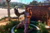 A statue capturing Brandi Chastain's iconic reaction to scoring the U.S. team's winning goal in the 1999 Women's World Cup, is shown after being unveiled outside the Rose Bowl in Pasadena, Calif., Wednesday, July 10, 2019. The 20th anniversary of the historic win coincided with celebrations in New York for this year's World Cup soccer championship team. (AP Photo/John Antczak)